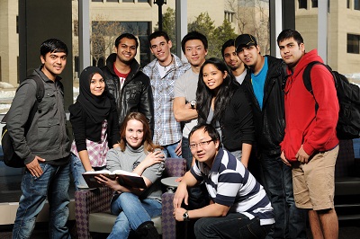 Students Students of different ethnicities posing in a group